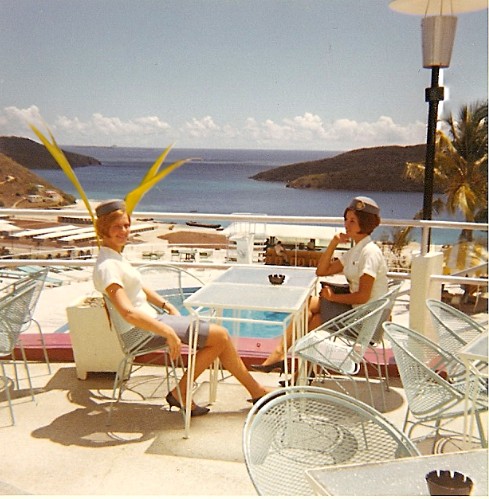 1967 Bernadette Degroote, left,  and  Venice Fernandez, right, enjoys a hotel buffet lunch pool side during a multi-hour transit on St. Croix